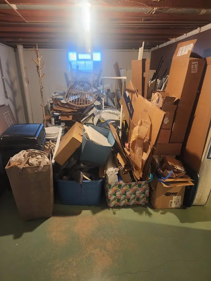 Roll-off dumpster container at job site for 2 Yard Dumpster Rental in Mount Oliver